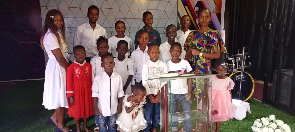 Children of the ministry gathered together during a Sunday service